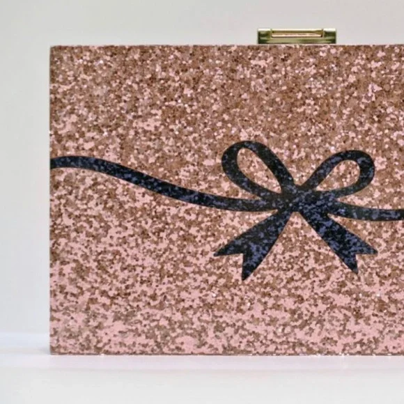Kate Spade Glitter Dress the Part Mask Clutch
